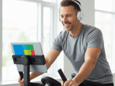 „Noriu“ ir „Reikia“ sujungimas: kaip norėti daryti tai, ką privalote? vyras sportuoja salėje ir žiūri filmukus